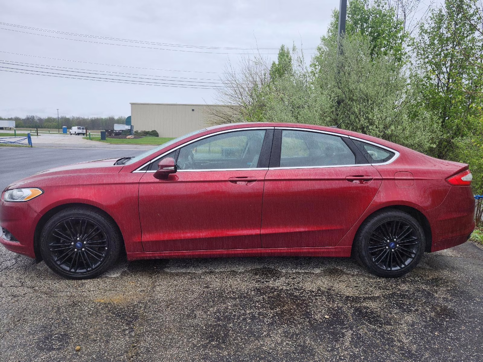 2016 Ruby Red Metallic Tinted Clearcoat Ford Fusion SE AWD Sedan