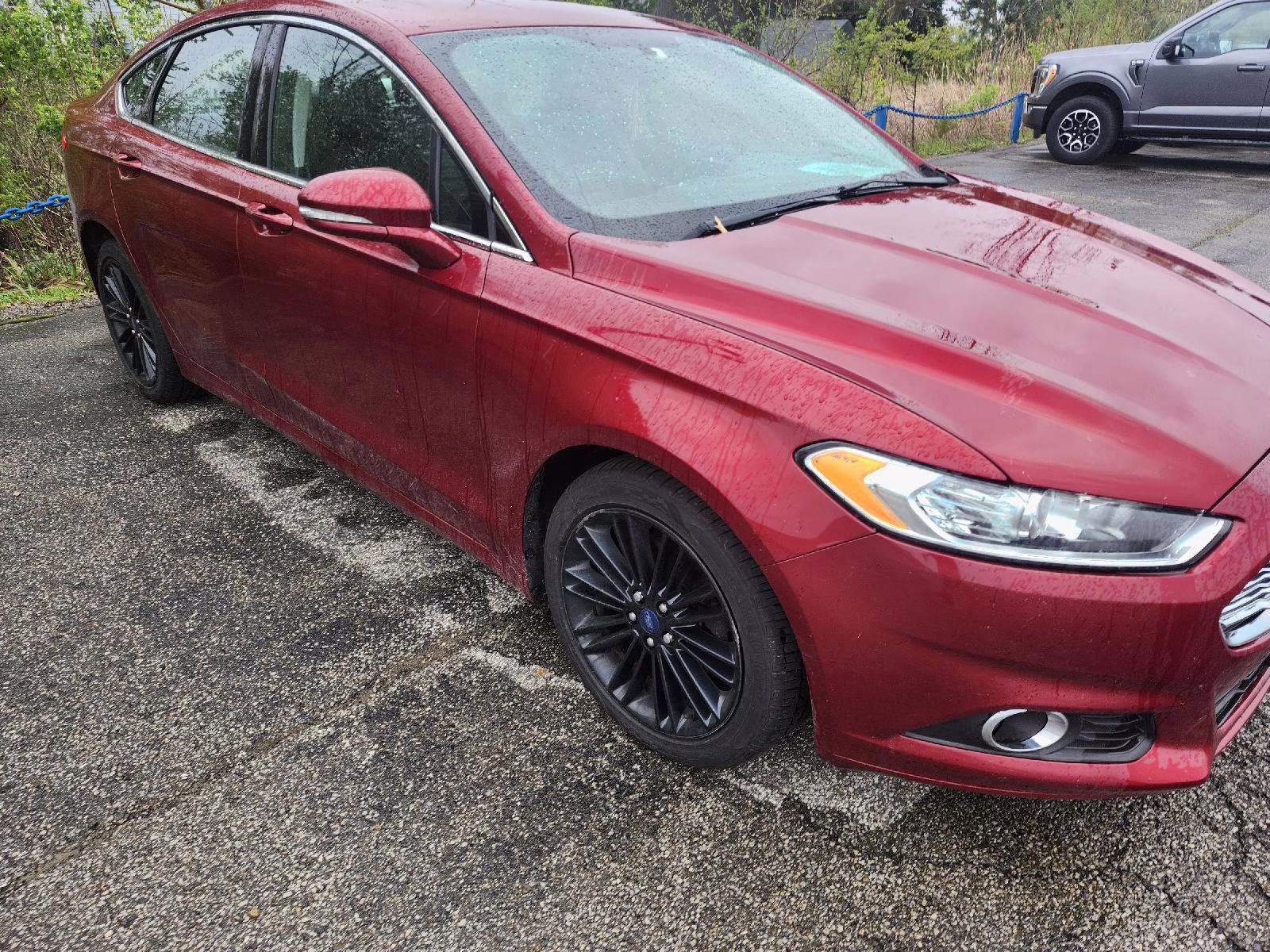 2016 Ruby Red Metallic Tinted Clearcoat Ford Fusion SE AWD Sedan
