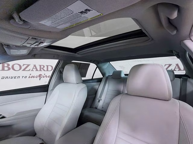 2015 Celestial Silver Metallic Toyota Camry XLE FWD Sedan