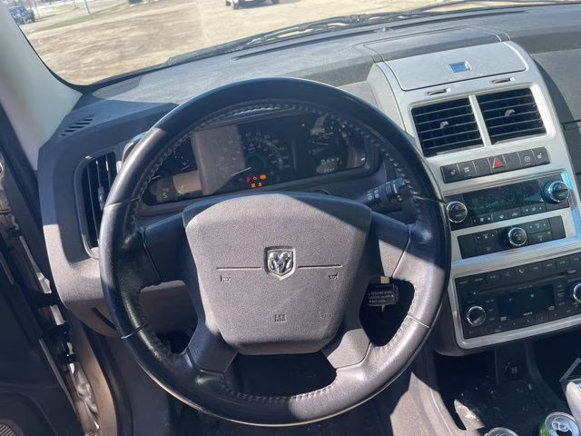 2009 Bright Silver Metallic Clearcoat Dodge Journey SXT AWD SUV