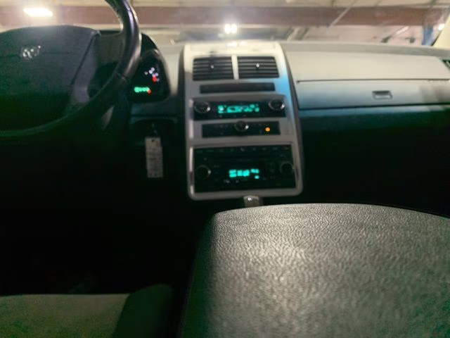 2009 Bright Silver Metallic Clearcoat Dodge Journey SXT AWD SUV