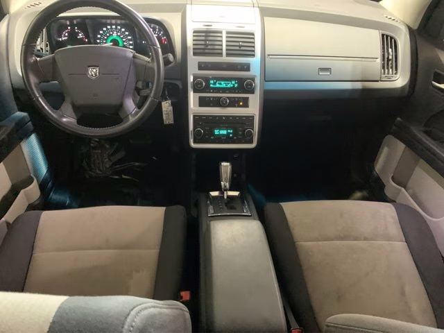 2009 Bright Silver Metallic Clearcoat Dodge Journey SXT AWD SUV