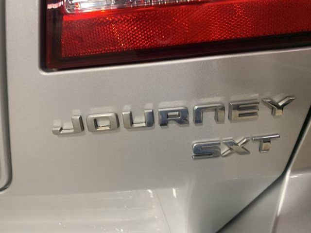 2009 Bright Silver Metallic Clearcoat Dodge Journey SXT AWD SUV
