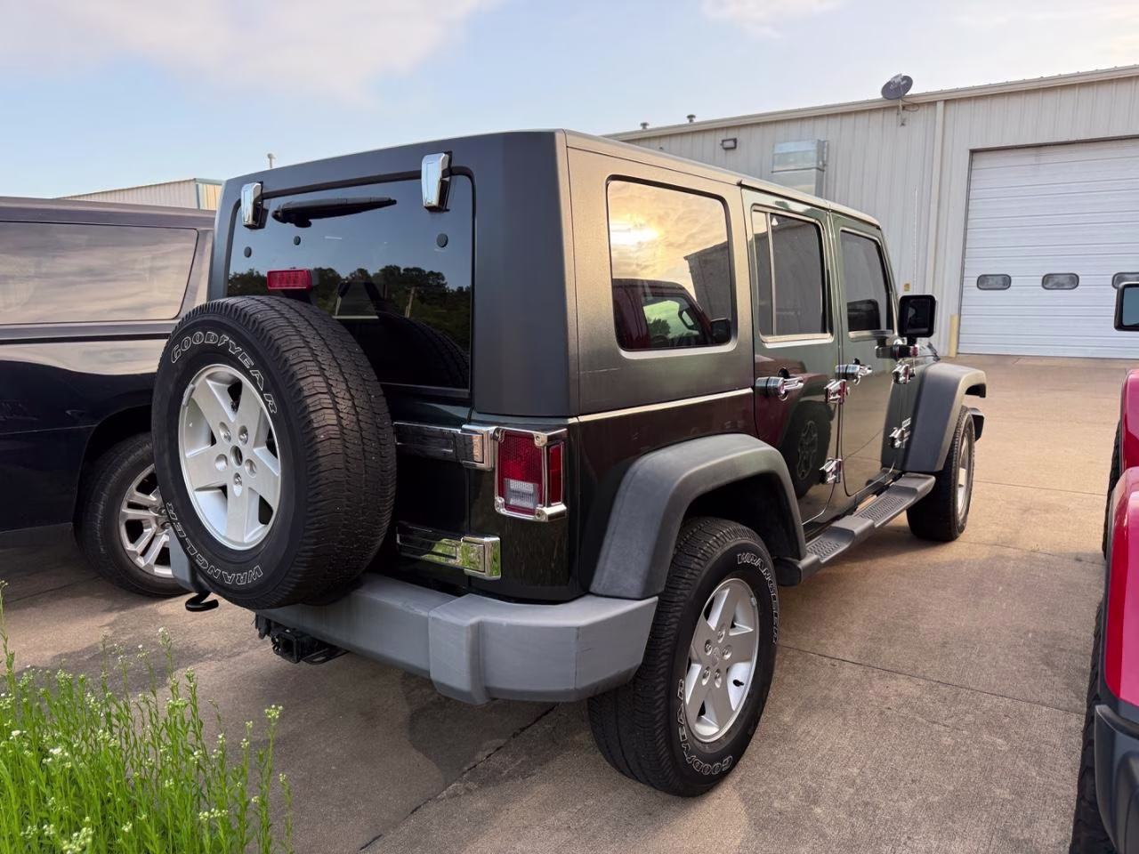 2010 Natural Green Pearl Jeep Wrangler Unlimited Sport 4X4 SUV