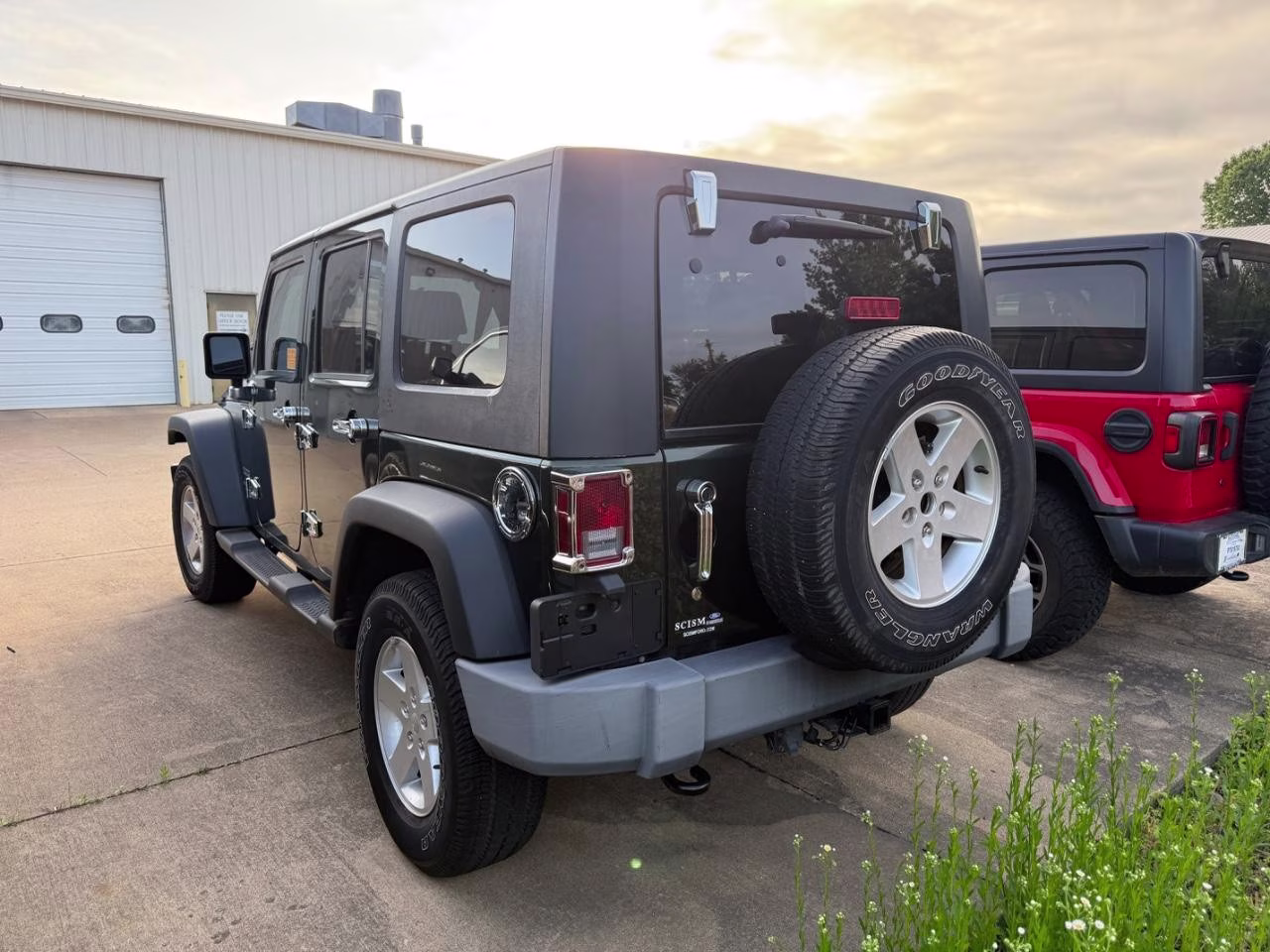 2010 Natural Green Pearl Jeep Wrangler Unlimited Sport 4X4 SUV
