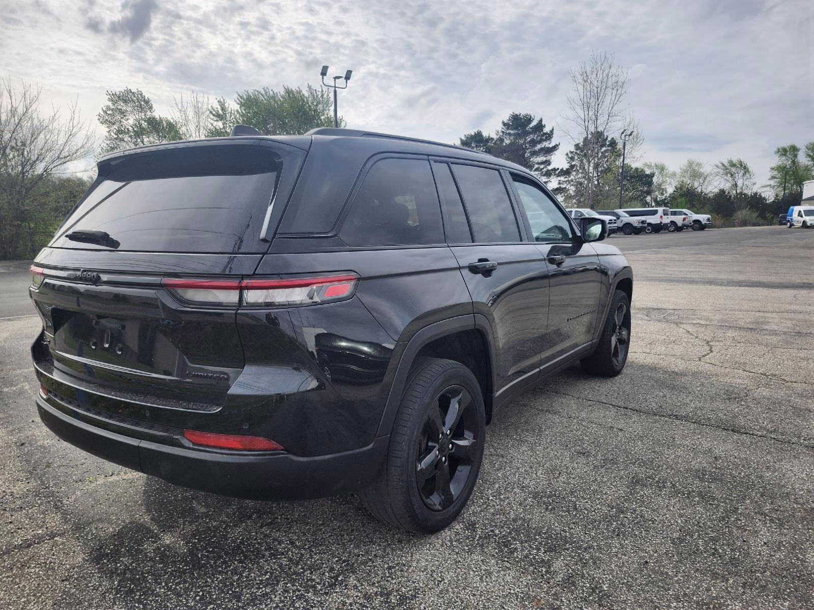 2023 Diamond Black Crystal Pearlcoat Jeep Grand Cherokee Limited 4X4 SUV