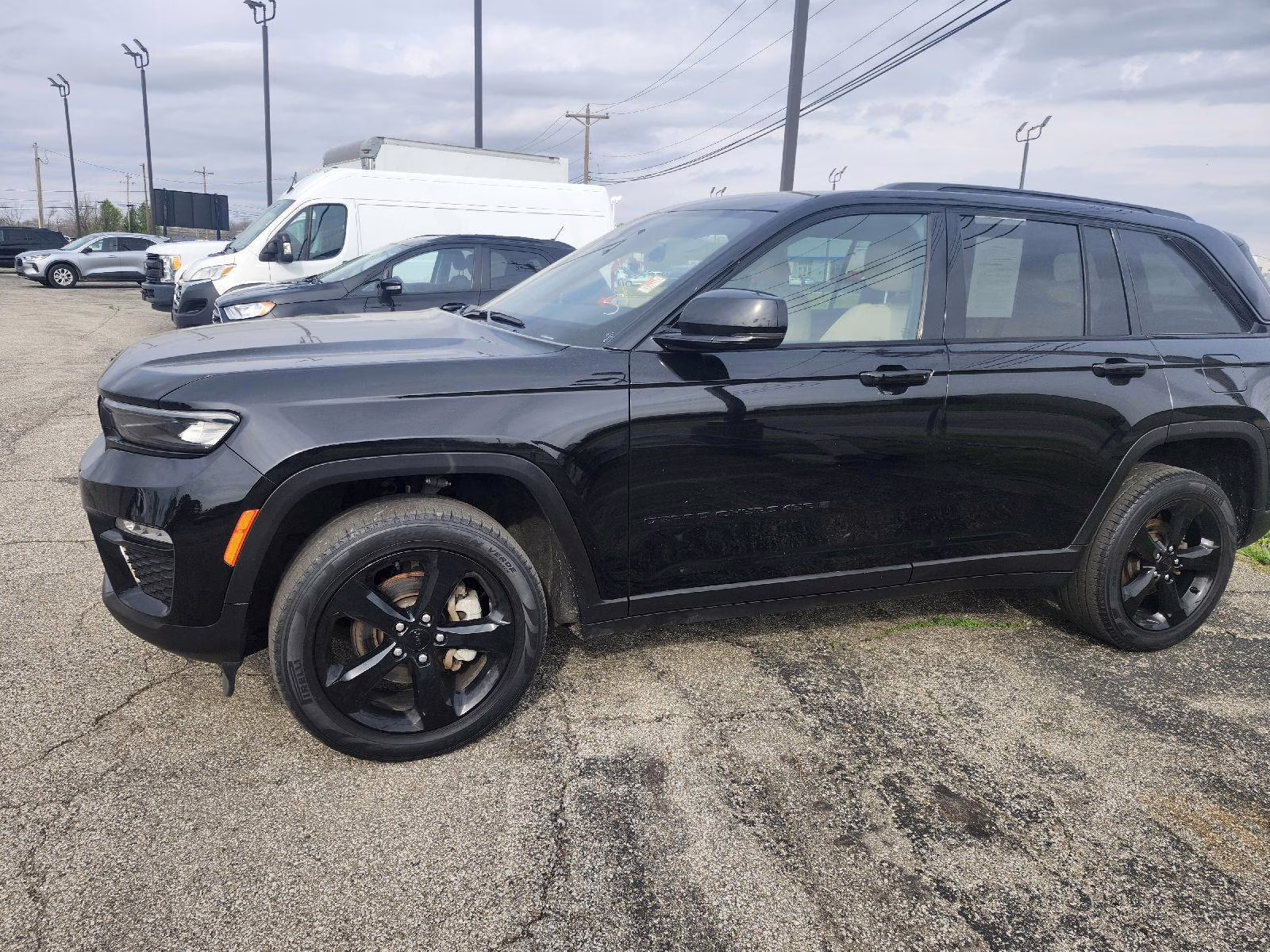 2023 Diamond Black Crystal Pearlcoat Jeep Grand Cherokee Limited 4X4 SUV