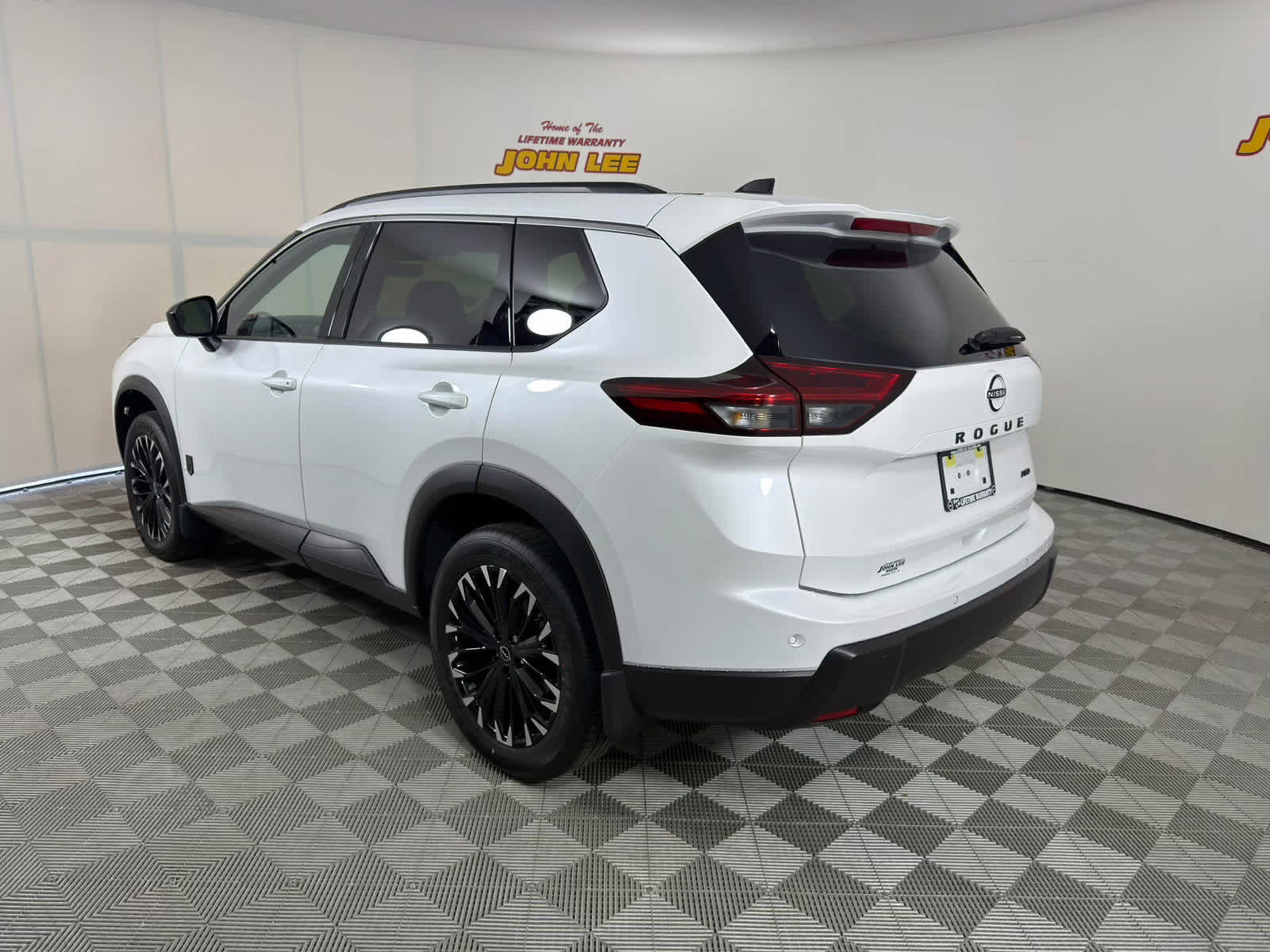 2026 Everest White Pearl Tricoat Nissan Rogue Dark Armor AWD SUV