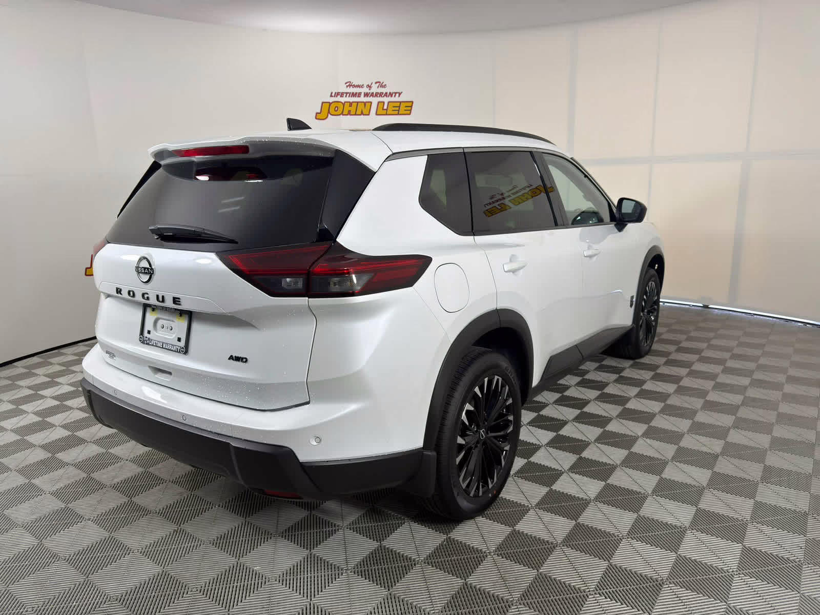 2026 Everest White Pearl Tricoat Nissan Rogue Dark Armor AWD SUV