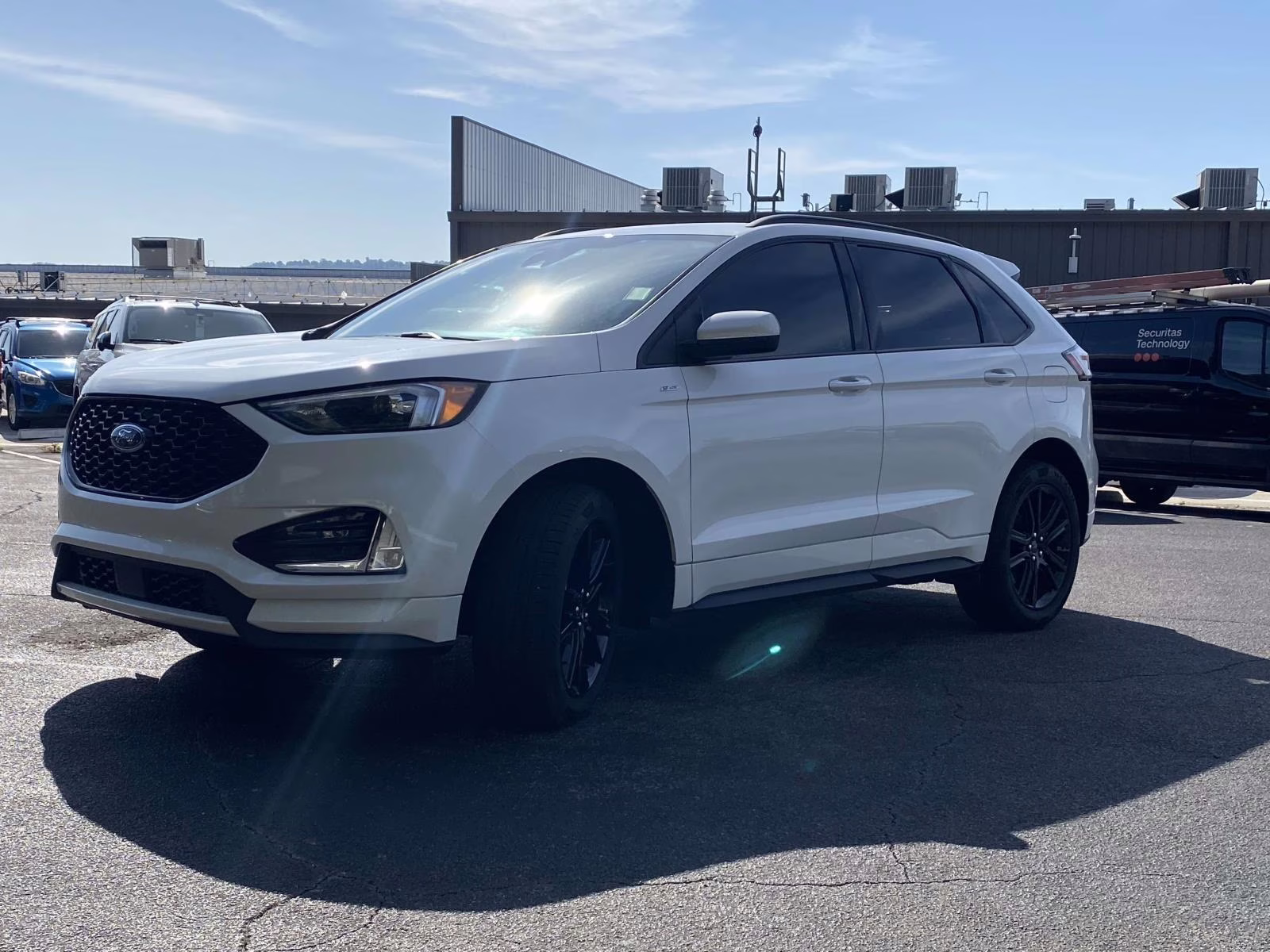 2022 Star White Metallic Tri-Coat Ford Edge ST Line AWD SUV
