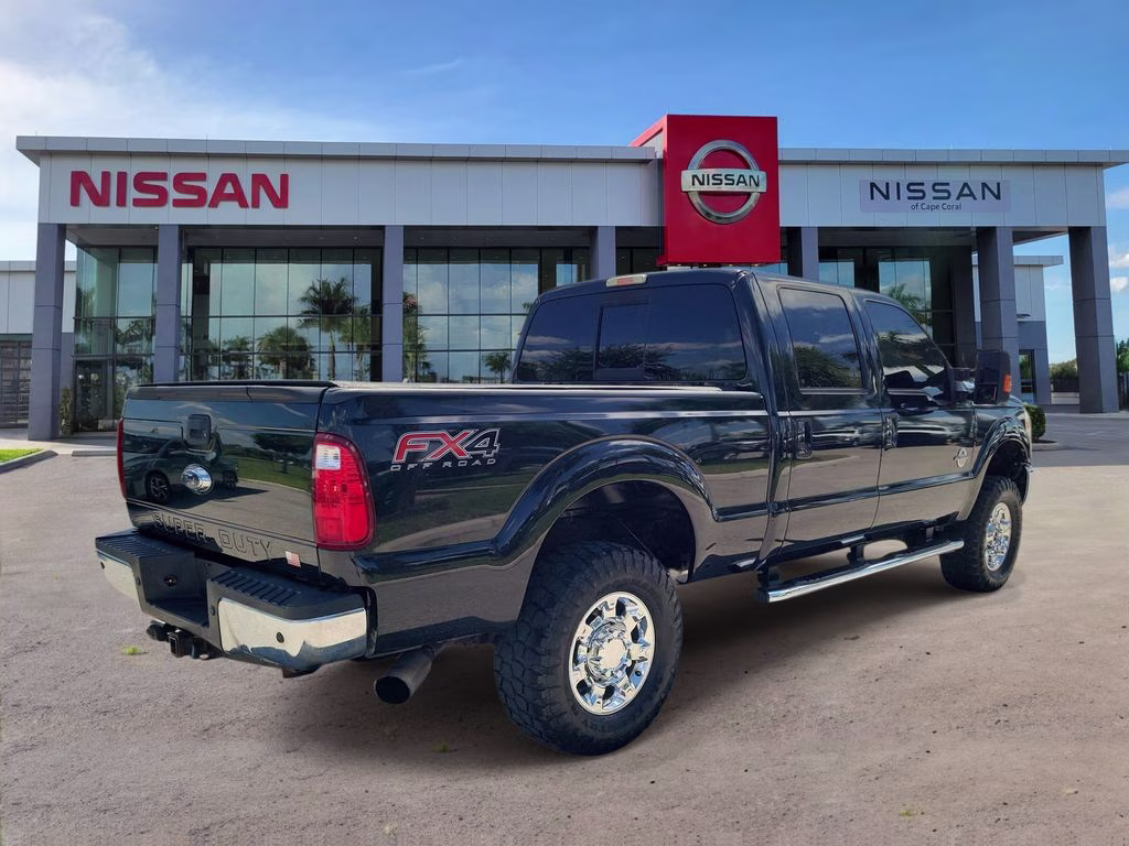 2014 Tuxedo Black Metallic Ford Super Duty F-350 SRW Lariat 4X4 Truck