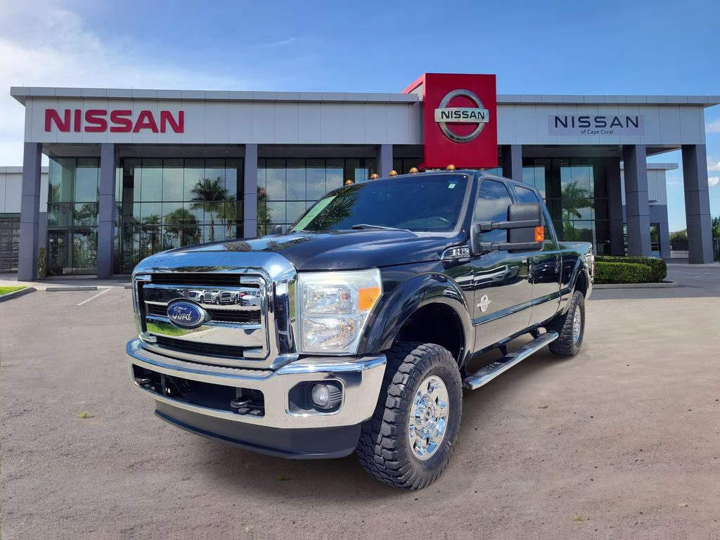 2014 Tuxedo Black Metallic Ford Super Duty F-350 SRW Lariat 4X4 Truck