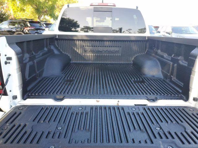 2026 Glacier White Nissan Frontier SV 4X4 Truck