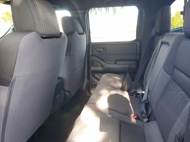 2026 Glacier White Nissan Frontier SV 4X4 Truck