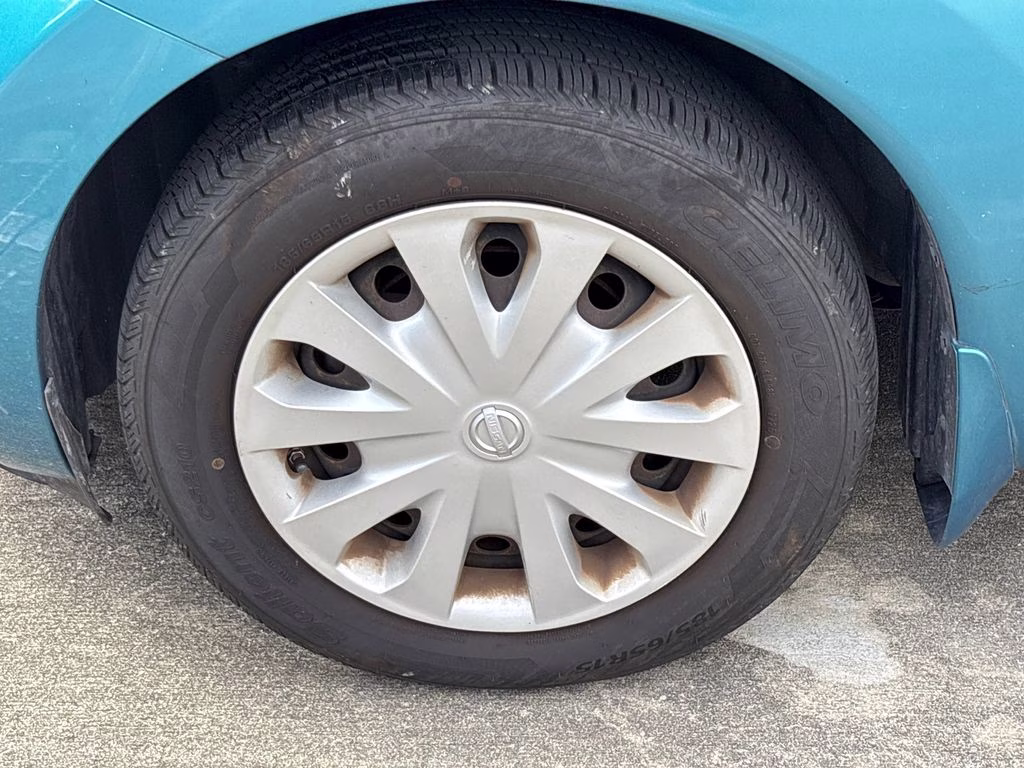 2015 Metallic Peacock Nissan Versa Note SV FWD Hatchback
