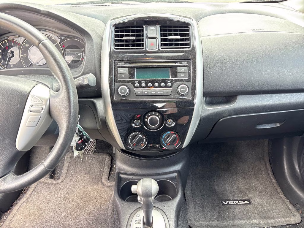 2015 Metallic Peacock Nissan Versa Note SV FWD Hatchback