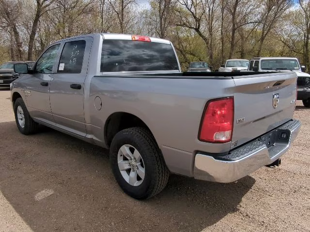 2023 Billet Silver Metallic Clearcoat Ram 1500 SLT 4X4 Truck