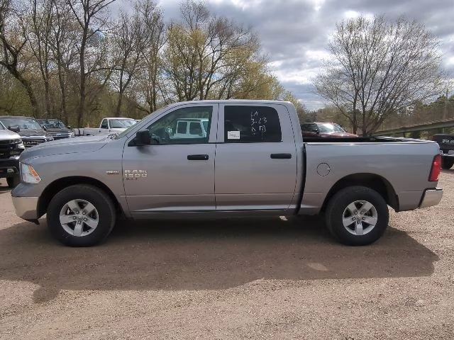 2023 Billet Silver Metallic Clearcoat Ram 1500 SLT 4X4 Truck