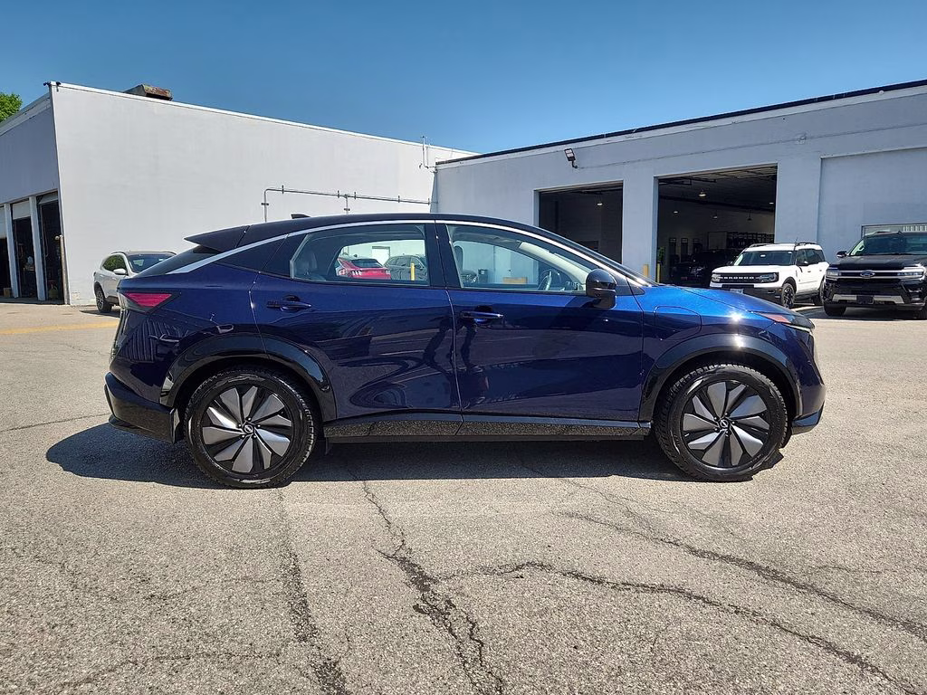 2023 Deep Ocean Blue Pearl/Black Diamond Pearl Nissan ARIYA EVOLVE+ FWD SUV