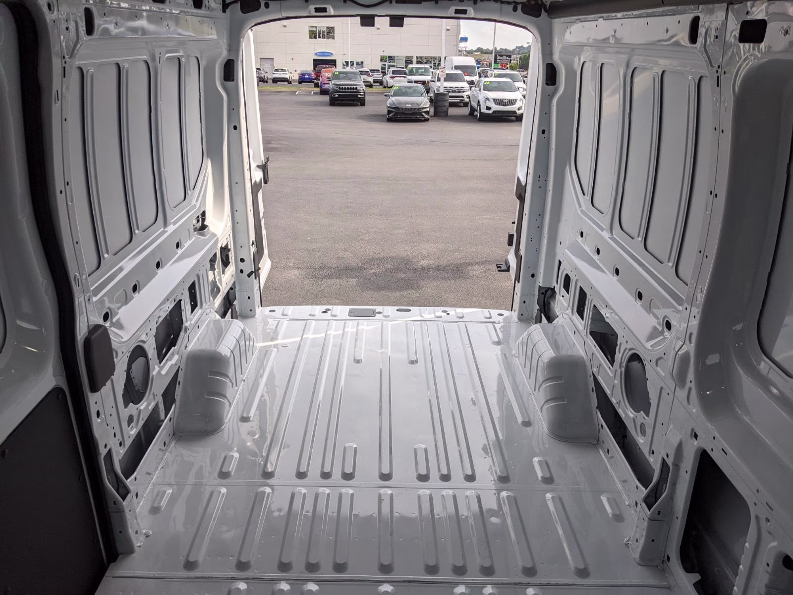 2026 Oxford White Ford Transit Cargo Van T-250 148 MED RF 9150 GV RWD Van