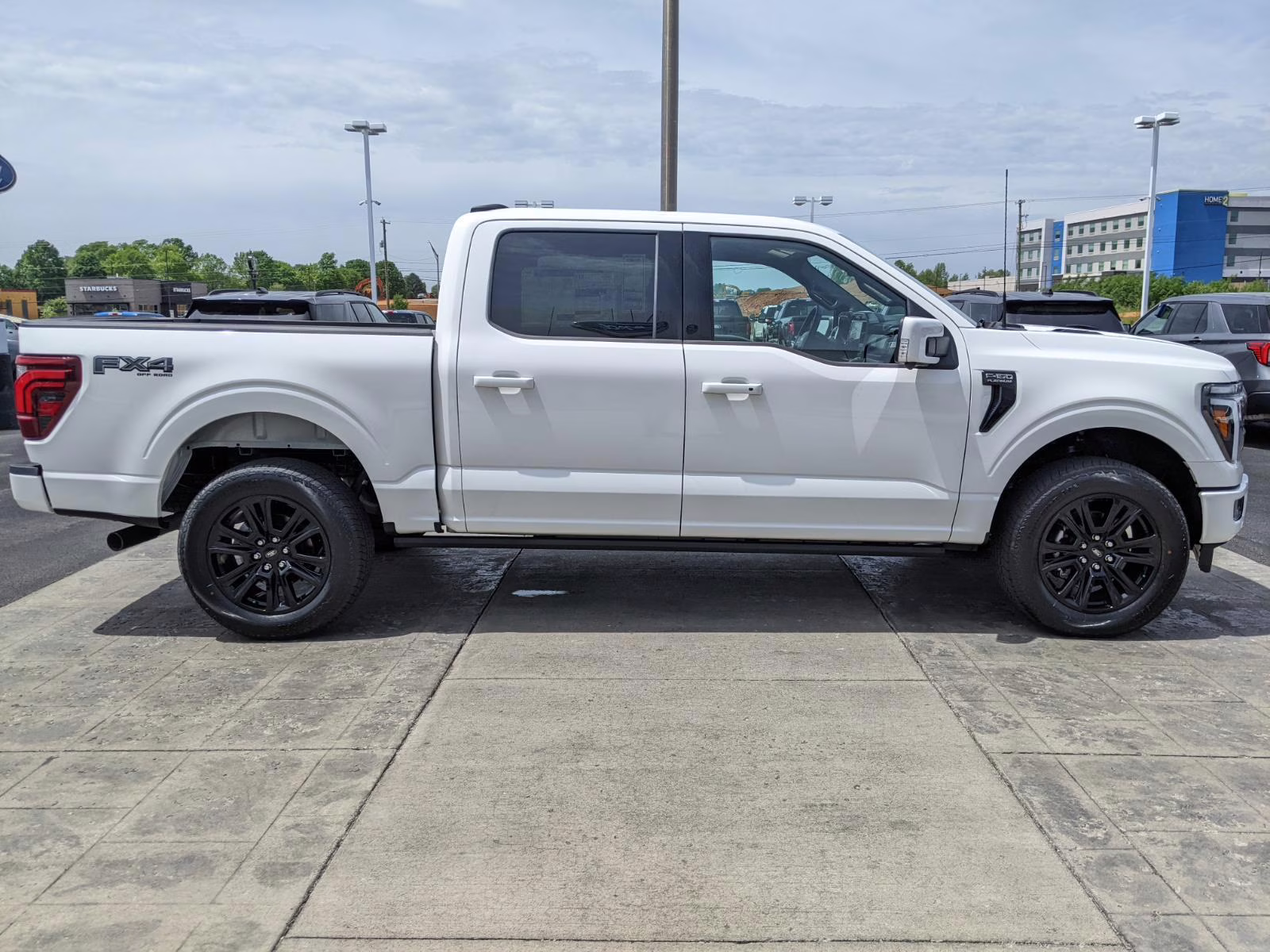 2026 Star White Metallic Tri-Coat Ford F-150 Platinum 4X4 Truck