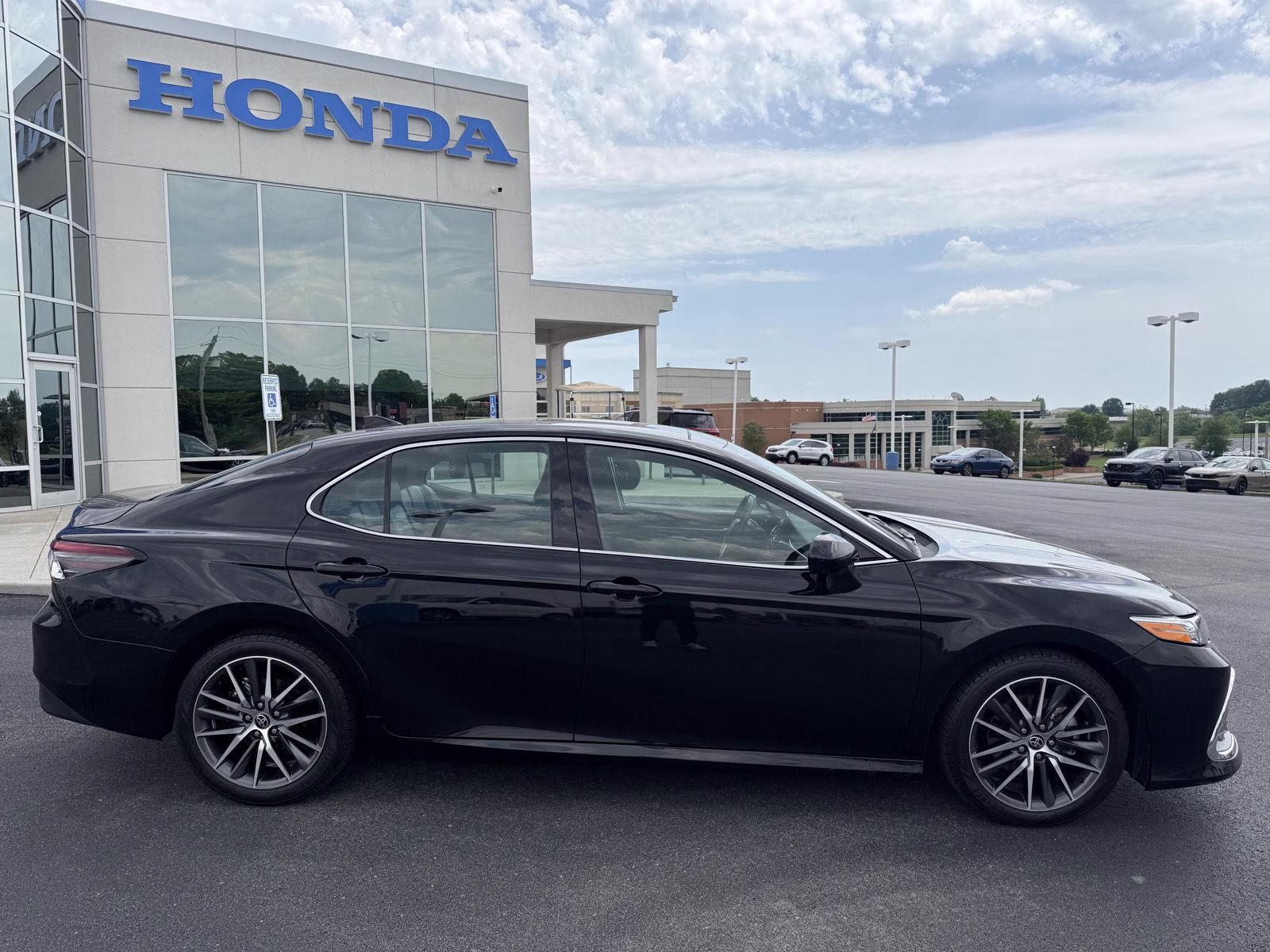 2023 Midnight Black Metallic Toyota Camry XLE V6 FWD Sedan