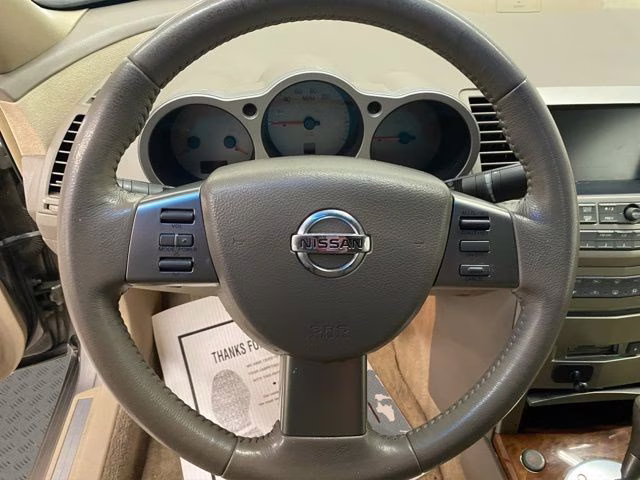 2004 Spirited Bronze Pearl Nissan Maxima 3.5 SL FWD Sedan