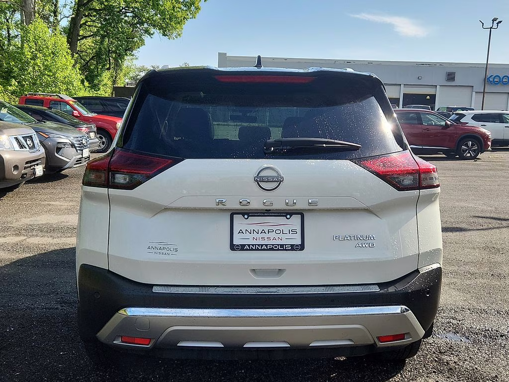 2023 Pearl White Tricoat/Super Black Nissan Rogue Platinum AWD SUV