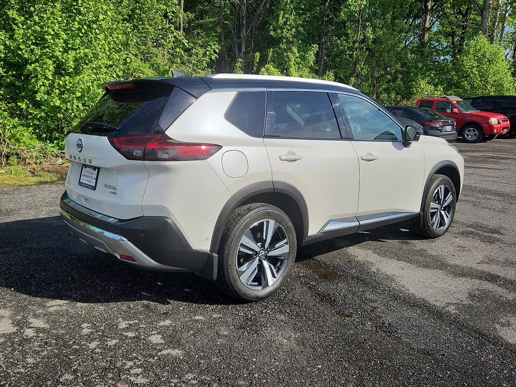 2023 Pearl White Tricoat/Super Black Nissan Rogue Platinum AWD SUV