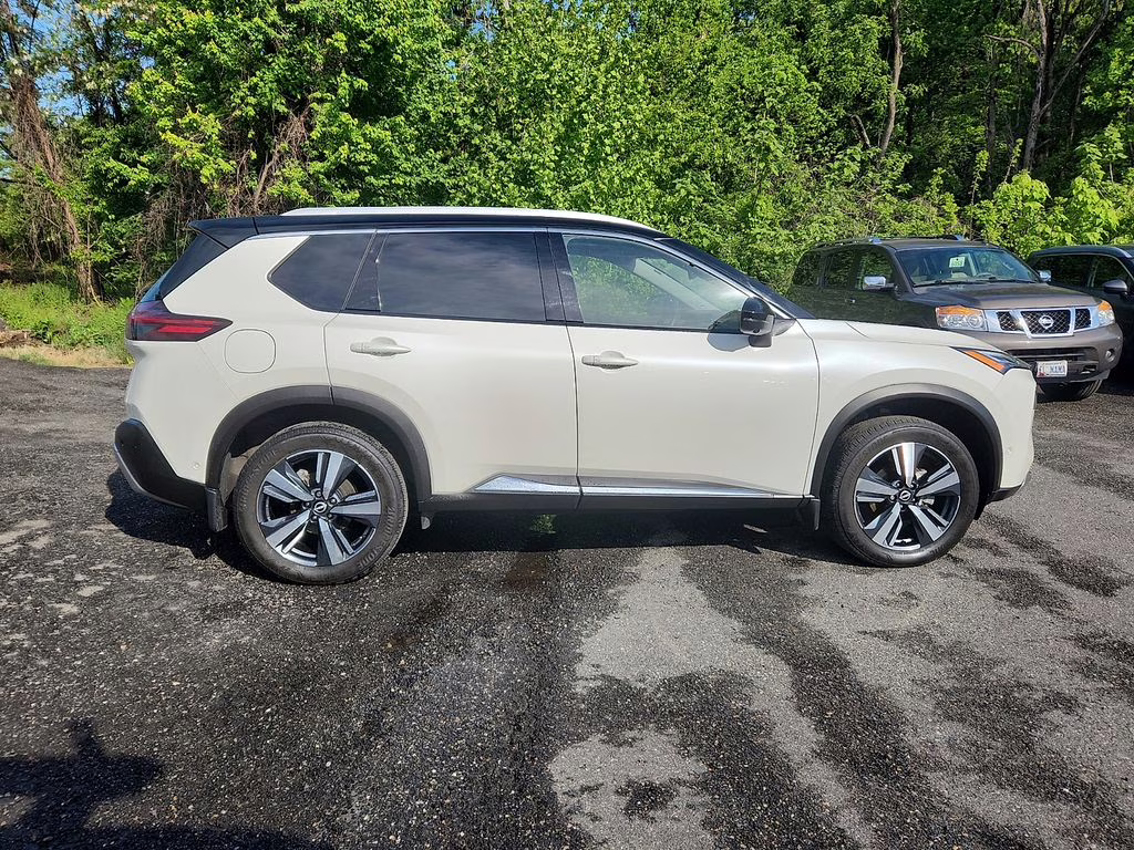 2023 Pearl White Tricoat/Super Black Nissan Rogue Platinum AWD SUV