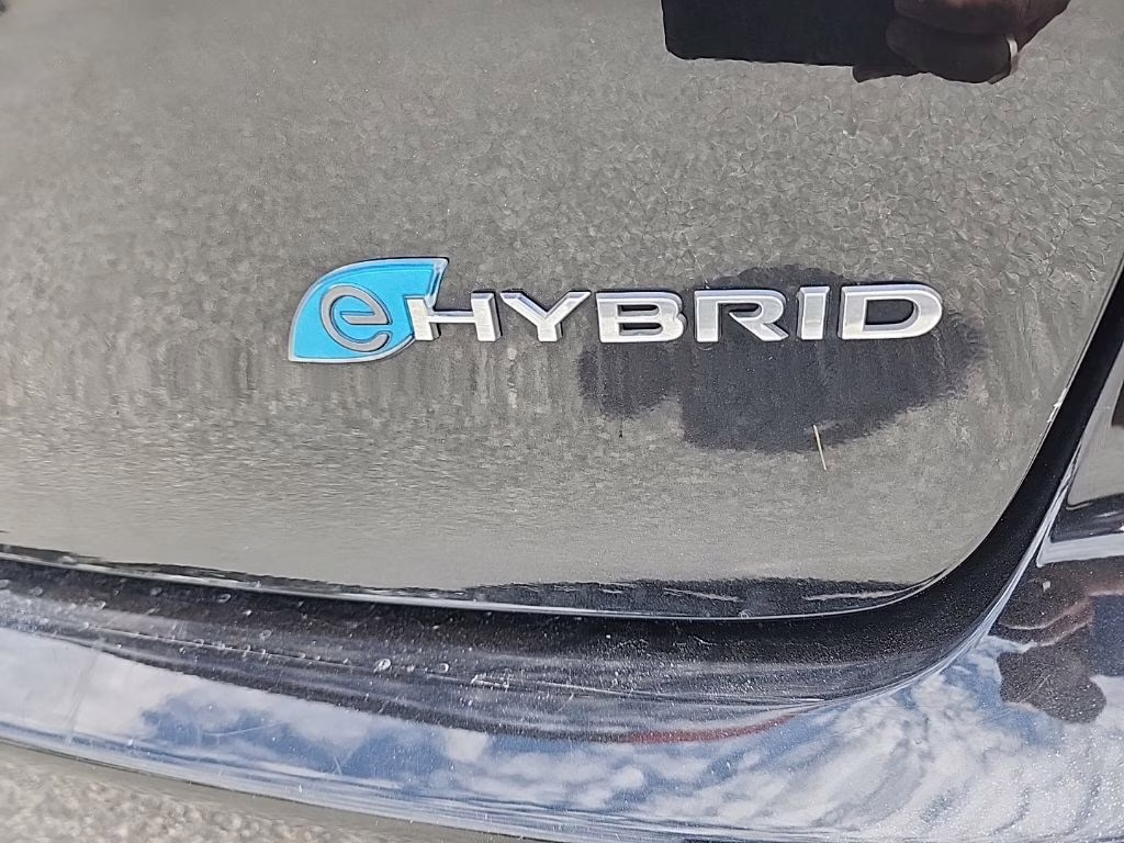 2023 Brilliant Black Crystal Pearlcoat Chrysler Pacifica Hybrid Touring L FWD Van