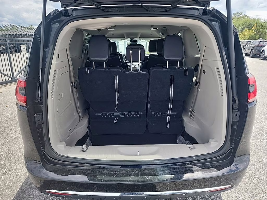 2023 Brilliant Black Crystal Pearlcoat Chrysler Pacifica Hybrid Touring L FWD Van