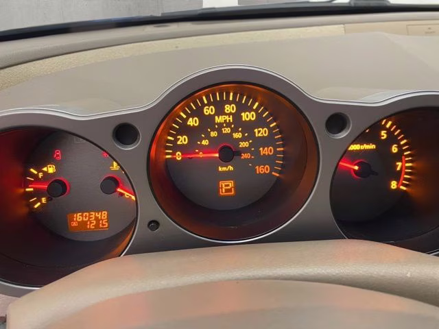 2004 Spirited Bronze Pearl Nissan Maxima 3.5 SL FWD Sedan