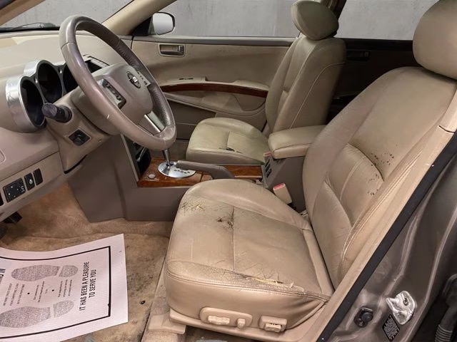 2004 Spirited Bronze Pearl Nissan Maxima 3.5 SL FWD Sedan