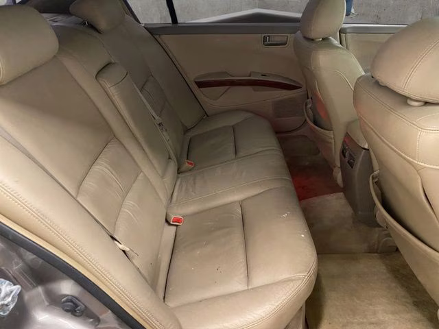 2004 Spirited Bronze Pearl Nissan Maxima 3.5 SL FWD Sedan
