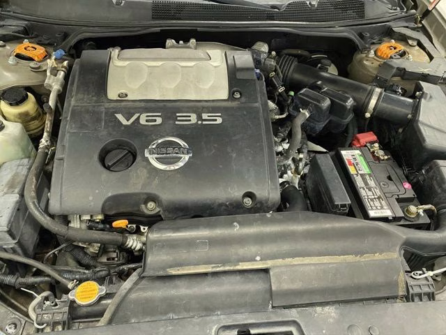 2004 Spirited Bronze Pearl Nissan Maxima 3.5 SL FWD Sedan