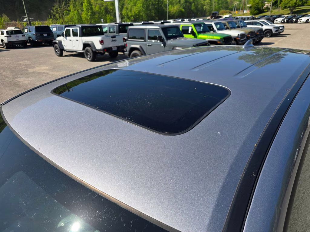 2023 Lunar Silver Metallic Honda Passport EX-L AWD SUV