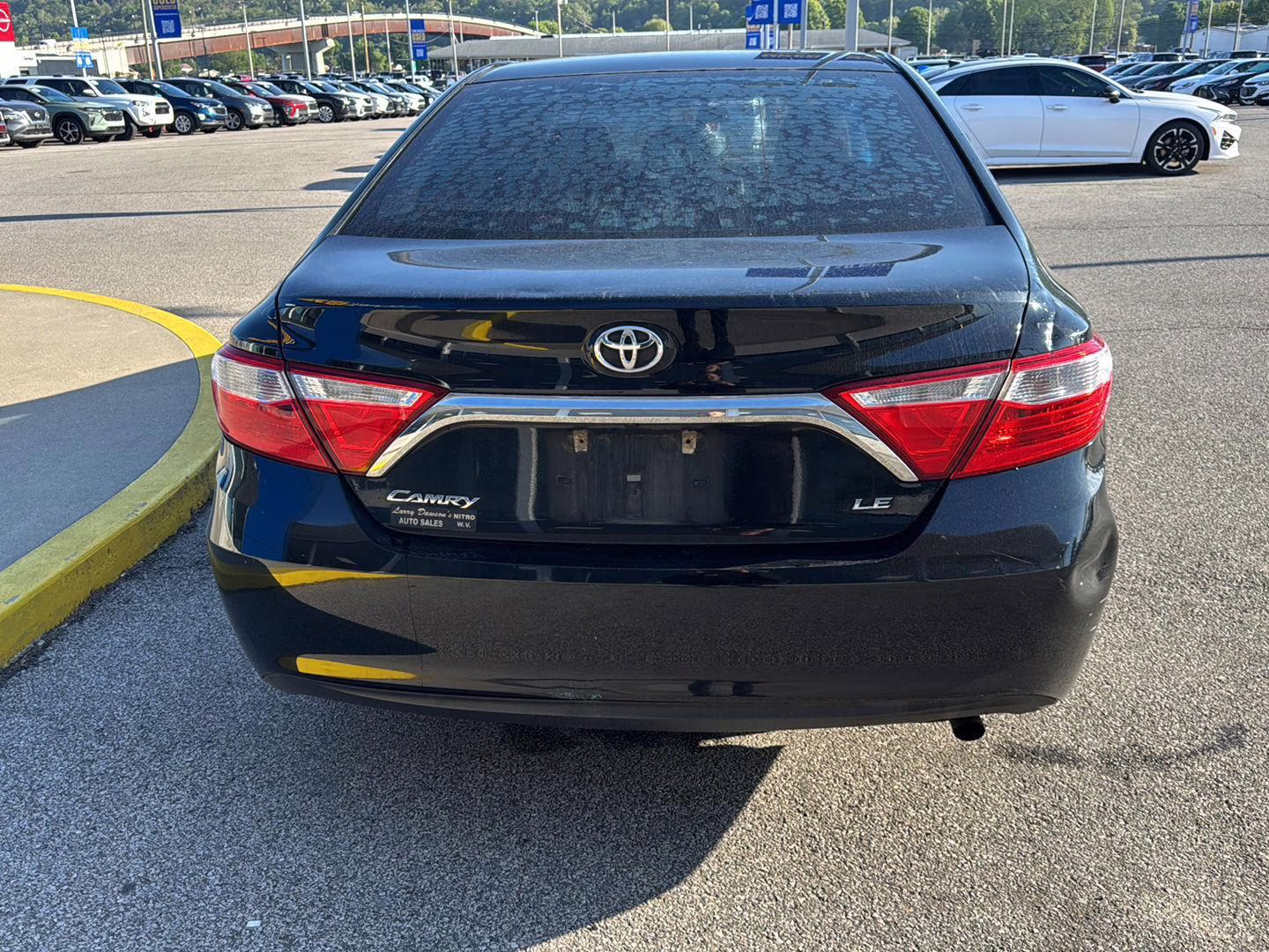 2017 Midnight Black Metallic Toyota Camry LE FWD Sedan