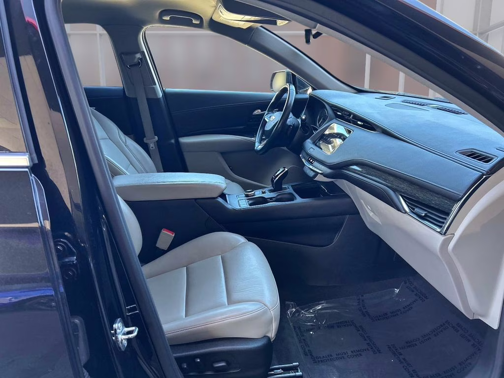 2023 Stellar Black Metallic Cadillac XT4 Premium Luxury AWD SUV