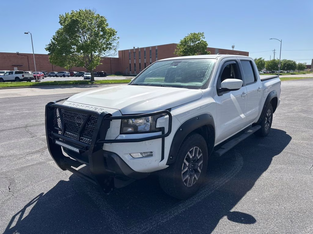 2023 Glacier White Nissan Frontier SV 4X4 Truck