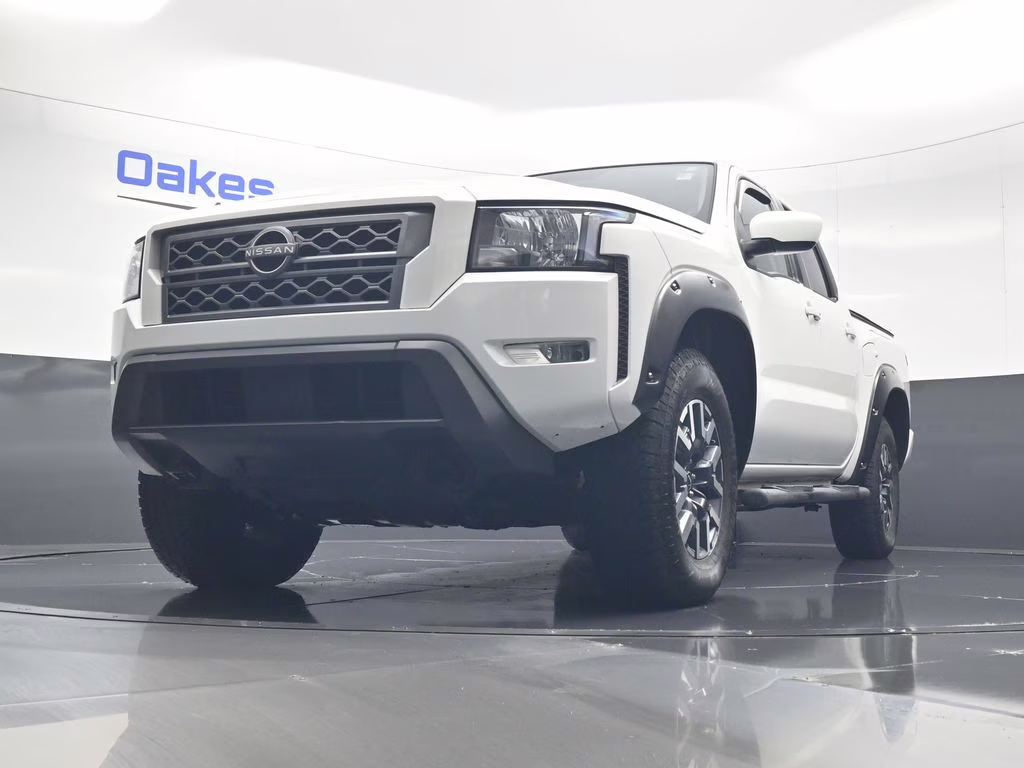 2023 Glacier White Nissan Frontier SV 4X4 Truck