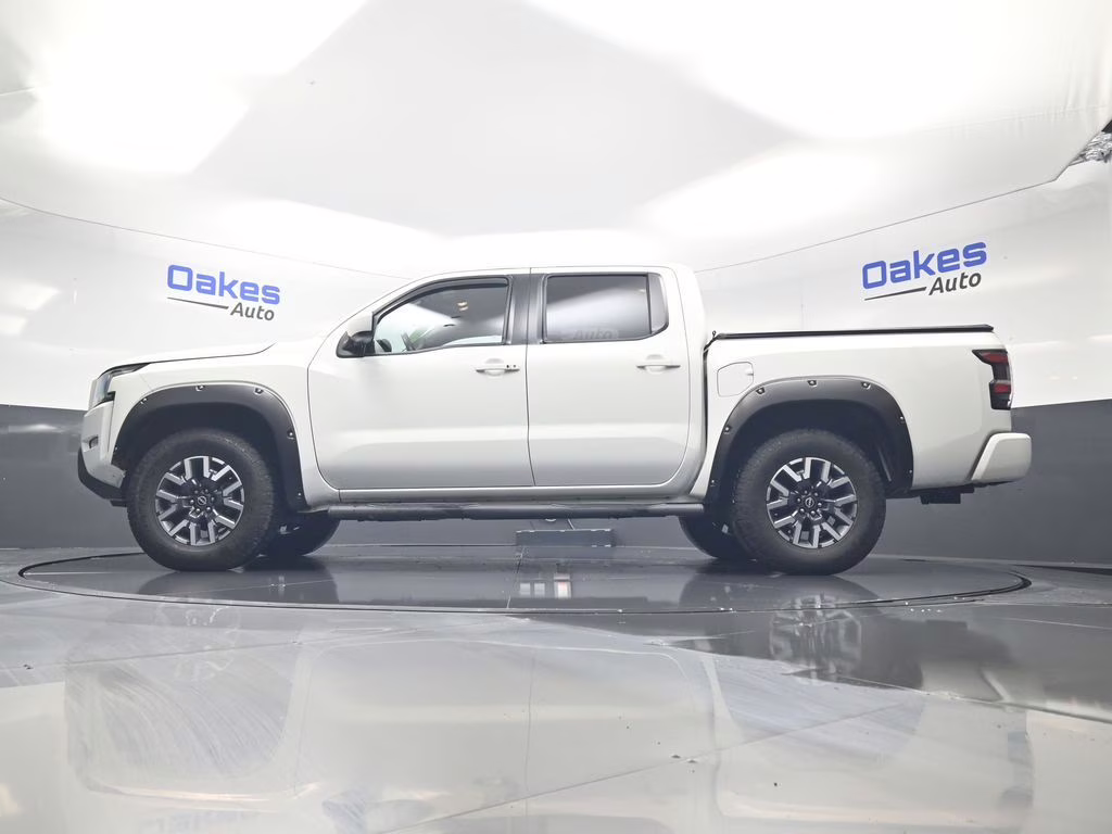 2023 Glacier White Nissan Frontier SV 4X4 Truck