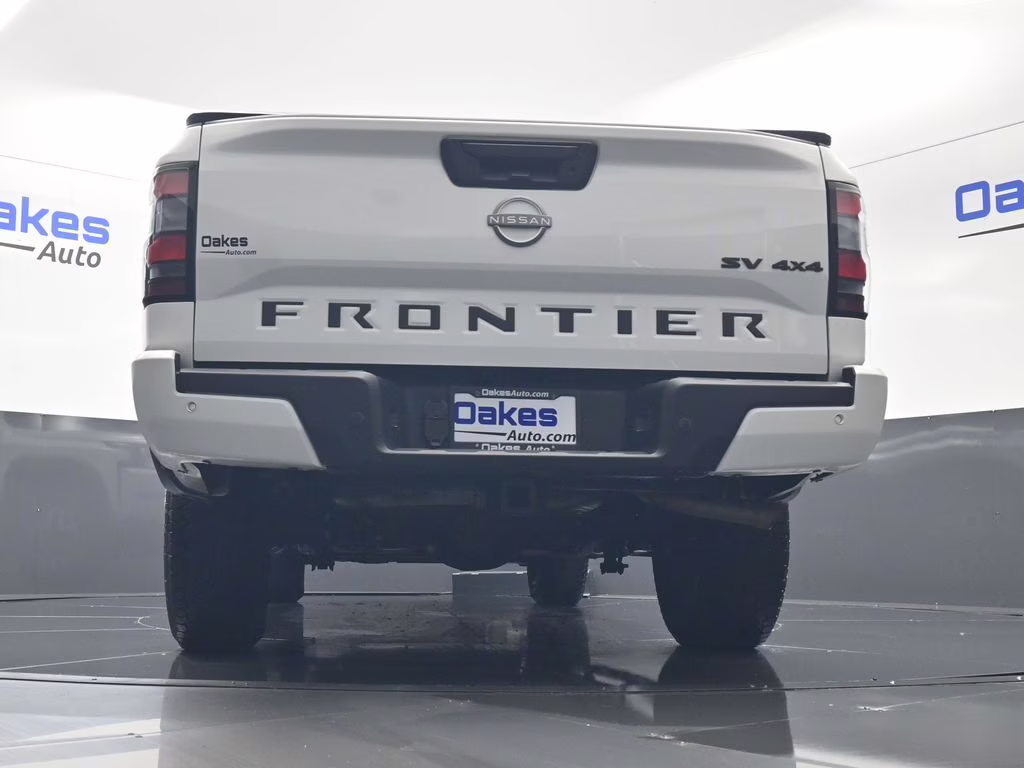 2023 Glacier White Nissan Frontier SV 4X4 Truck