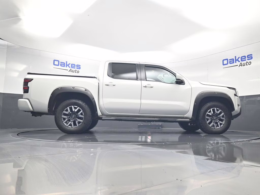 2023 Glacier White Nissan Frontier SV 4X4 Truck
