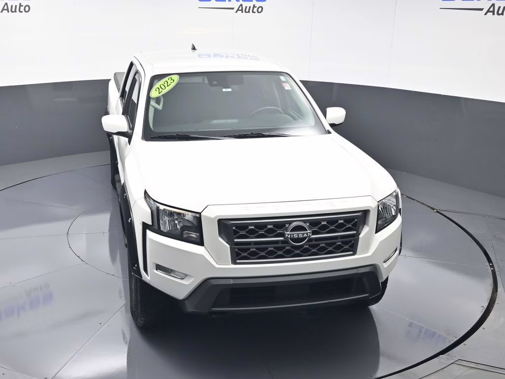 2023 Glacier White Nissan Frontier SV 4X4 Truck