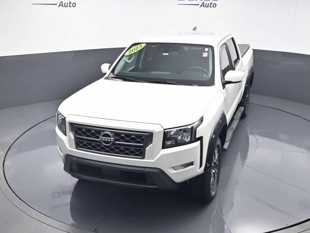 2023 Glacier White Nissan Frontier SV 4X4 Truck