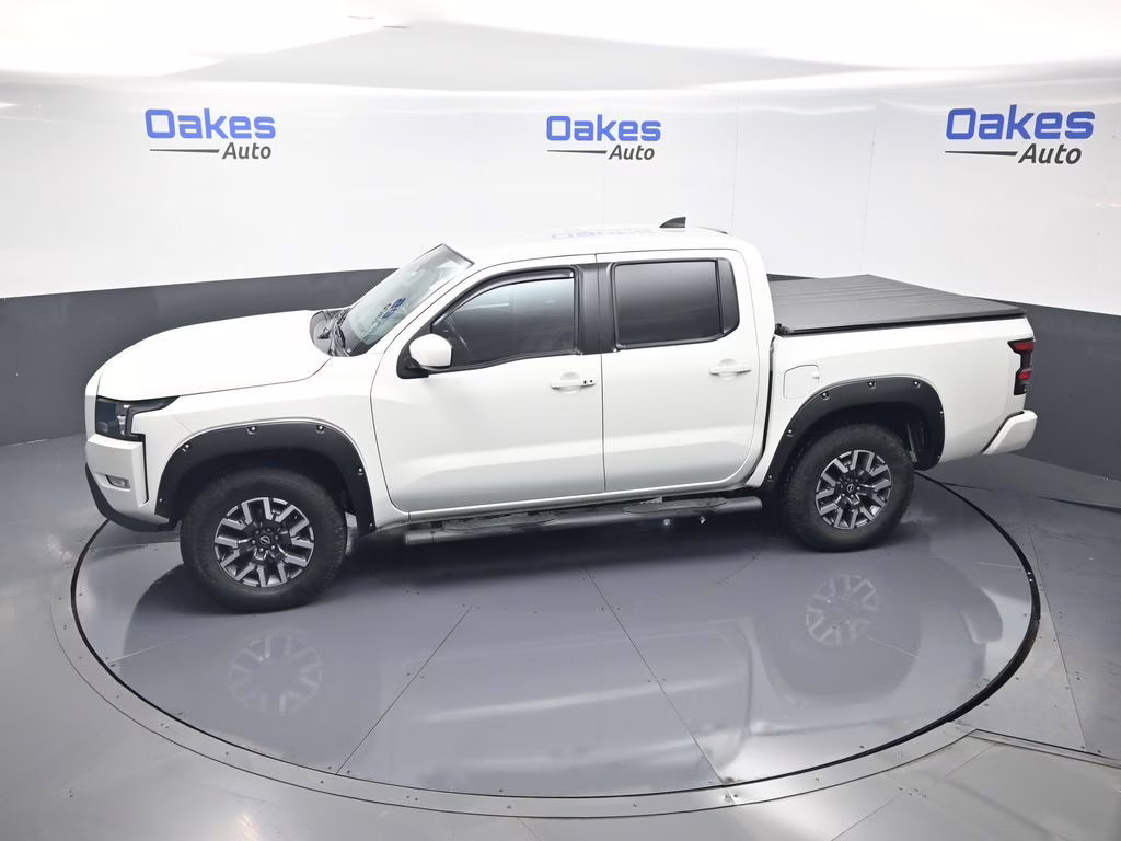 2023 Glacier White Nissan Frontier SV 4X4 Truck