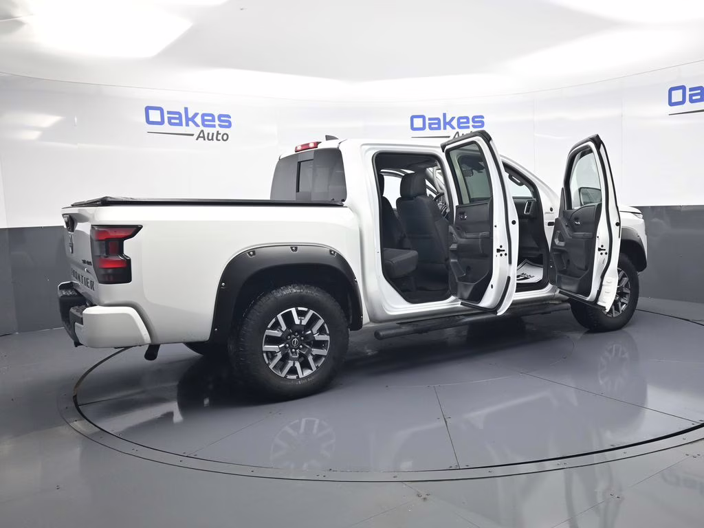 2023 Glacier White Nissan Frontier SV 4X4 Truck