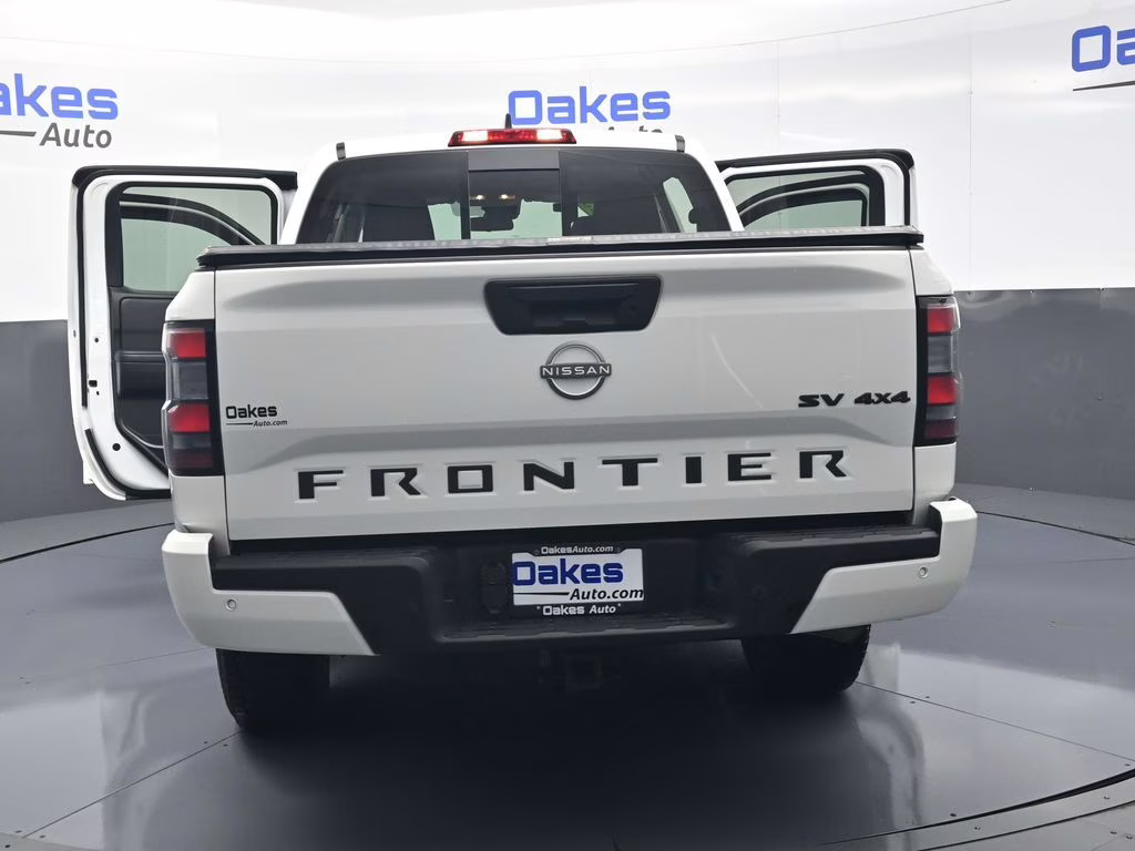 2023 Glacier White Nissan Frontier SV 4X4 Truck