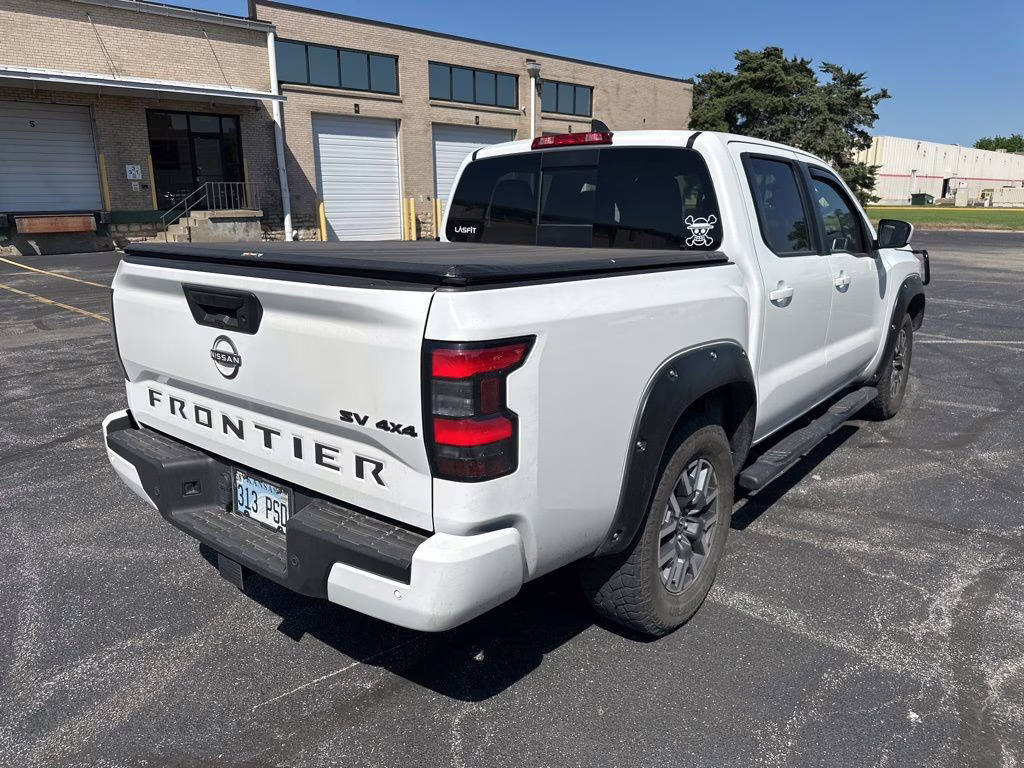 2023 Glacier White Nissan Frontier SV 4X4 Truck